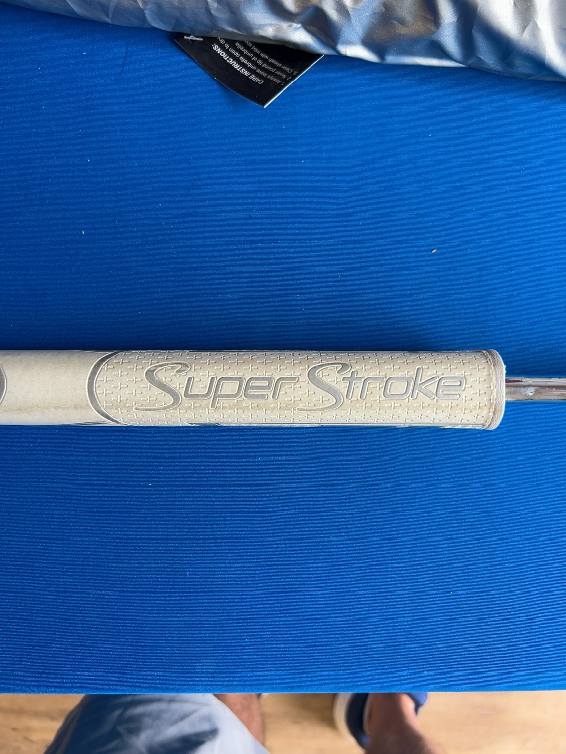 White Hot Pro #1 blade putter with the original White Hot insert and a SuperStroke grip.