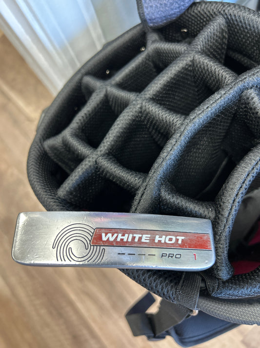 White Hot Pro #1 blade putter with the original White Hot insert and a SuperStroke grip.