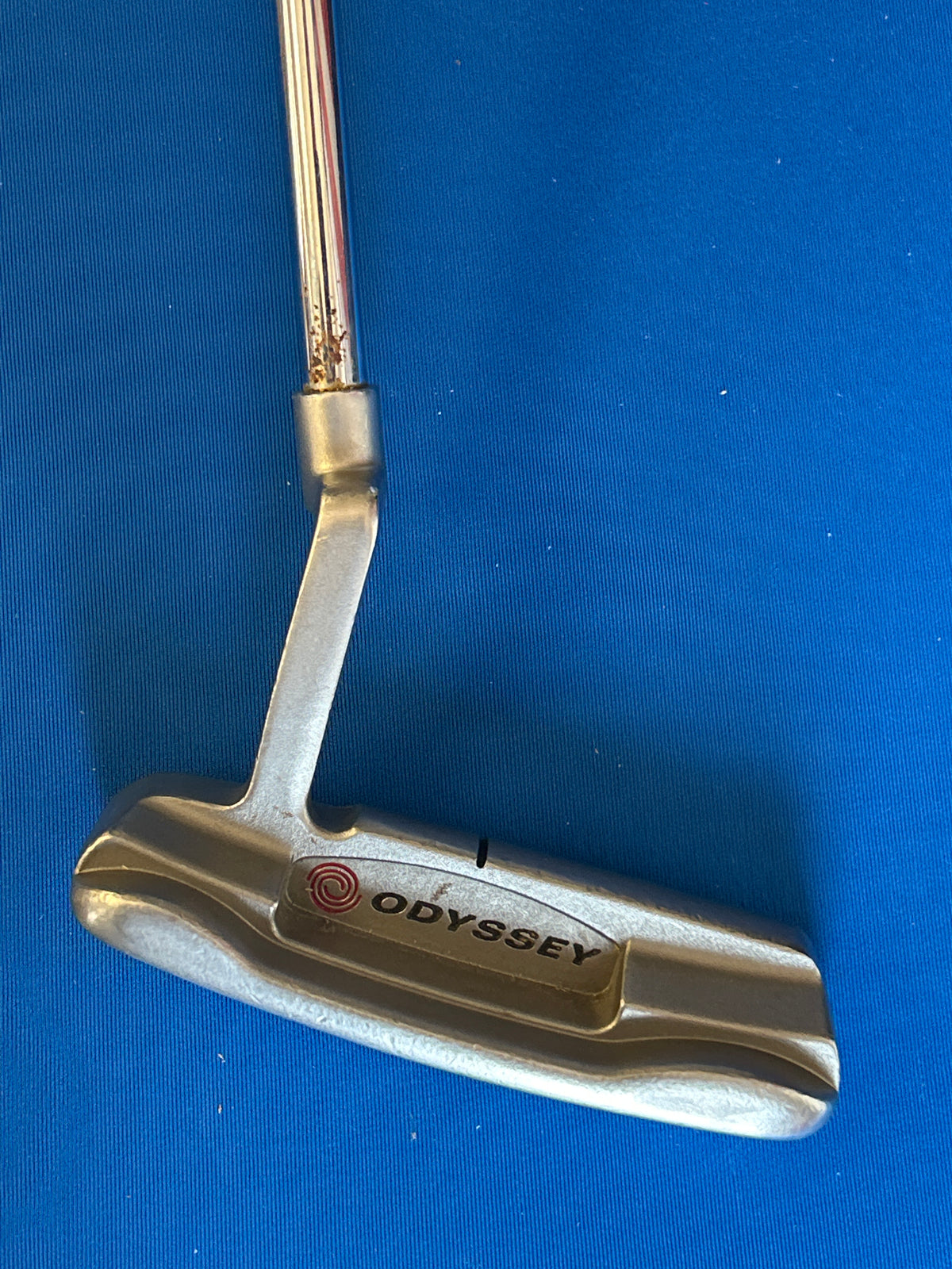 White Hot Pro #1 blade putter with the original White Hot insert and a SuperStroke grip.
