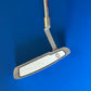 White Hot Pro #1 blade putter with the original White Hot insert and a SuperStroke grip.