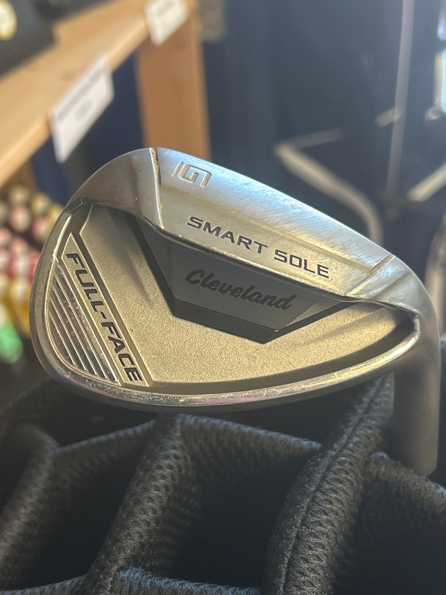 Cleveland Smart Sole Full-Face Chipper (C model) with a UST Mamiya Recoil 80 Wedge graphite shaft RH