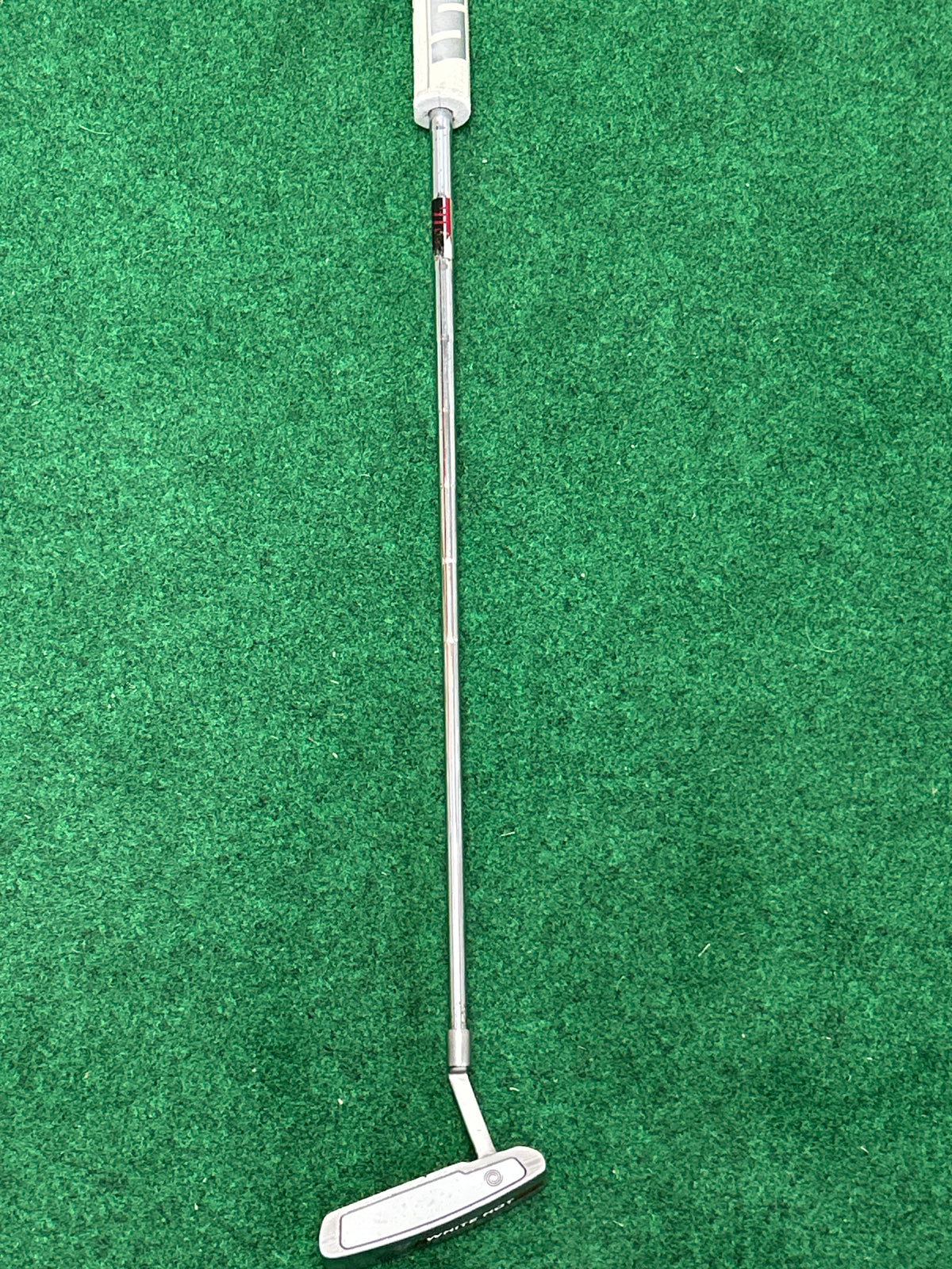 White Hot Pro #1 blade putter with the original White Hot insert and a SuperStroke grip.